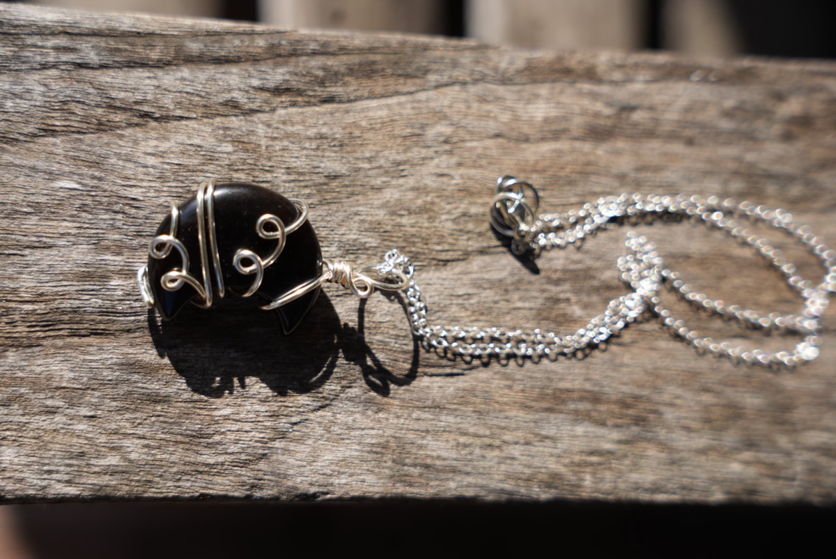 Black Round Bead in Silver Scrollwork