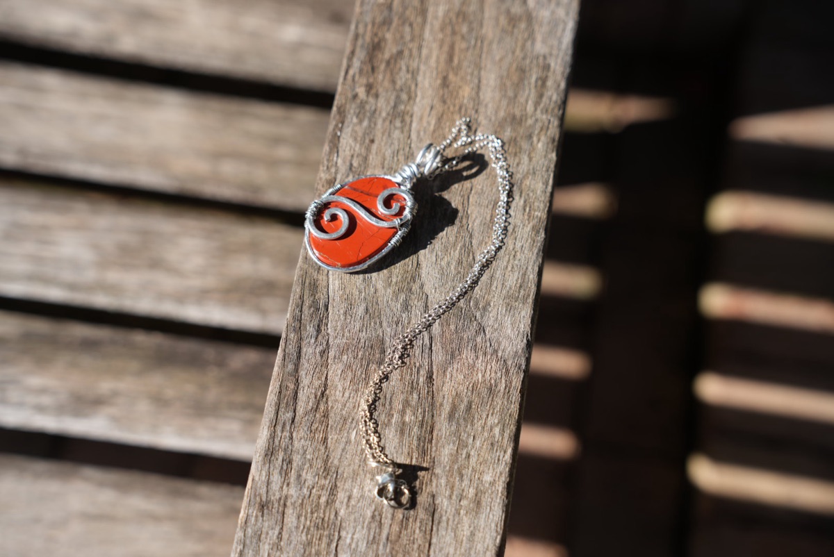 Orange-Red Teardrop with Double Spiral